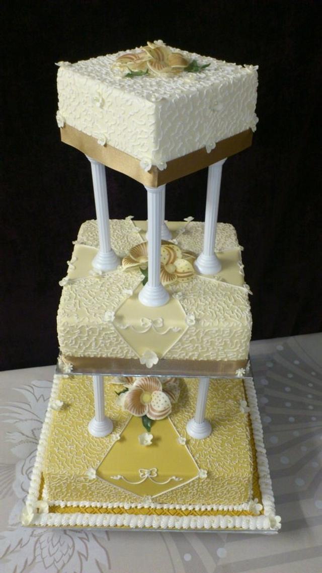 wedding cake on pillars Decorated Cake by Ribana CakesDecor