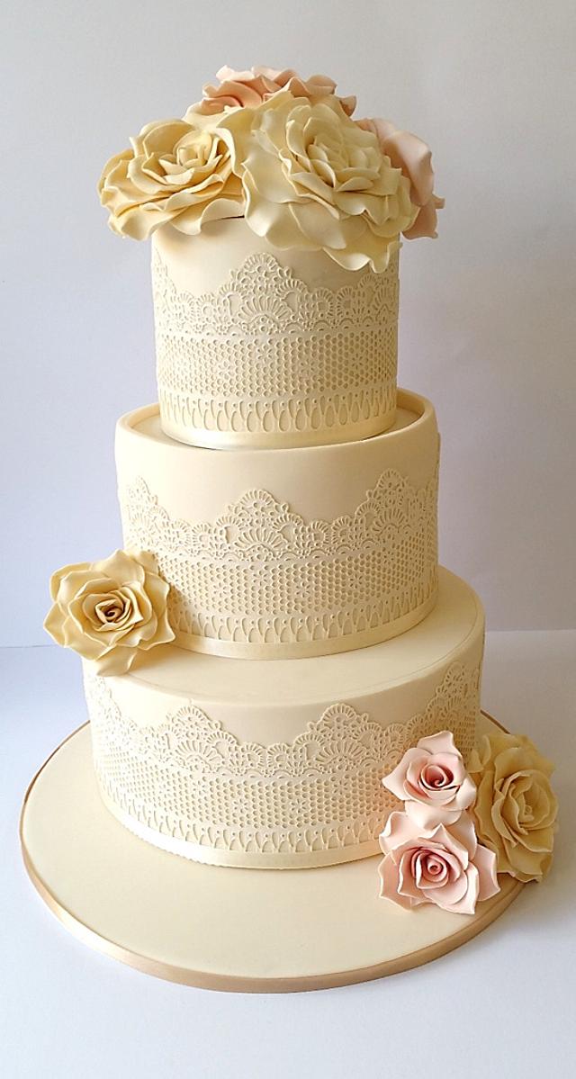 Scolloped Oval Ivory Wedding Cake | Imaginative Icing - Cakes -  Scarborough, York, Malton, Leeds, Hull, Bridlington, Whitby, Filey, and  across the UK