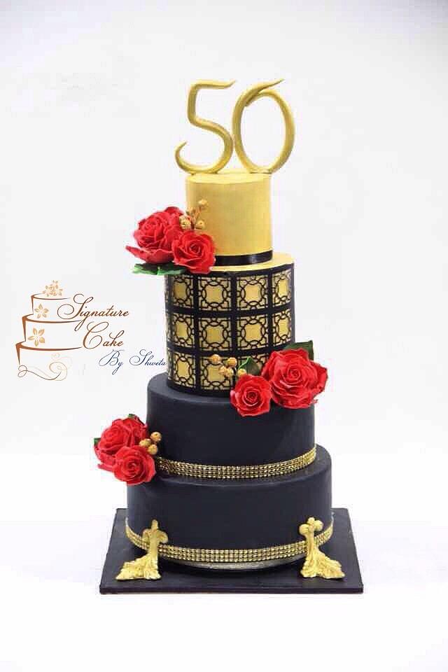 Black and Gold Magic Cake by Signature Cake By Shweta