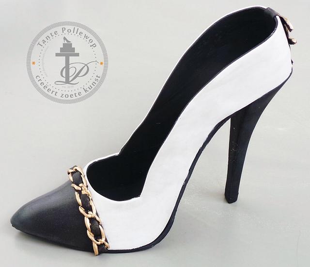 Chanel purse and high heel shoe
