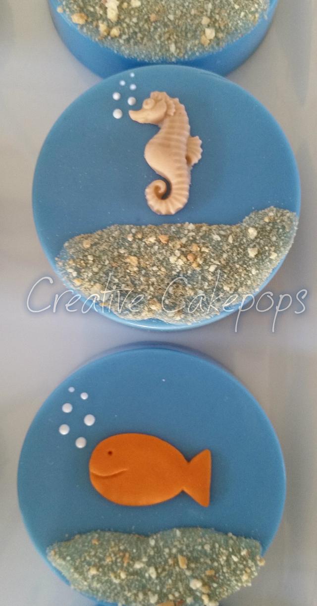 Under the Sea cake pops, Chocolate dipped Oreo's and Fish Cupcake cake