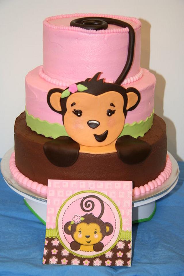 Girl monkey baby shower cake