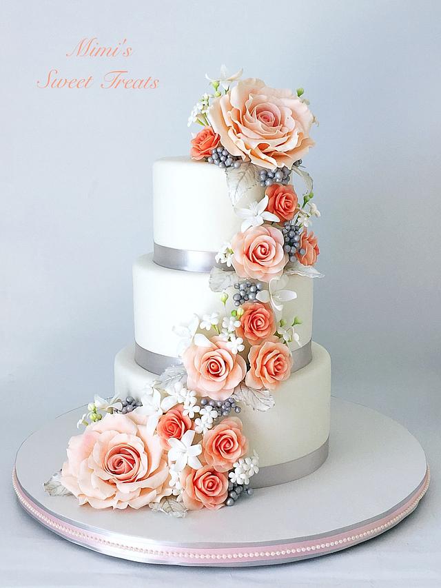 Cascading Flowers Wedding Cake Decorated Cake by CakesDecor