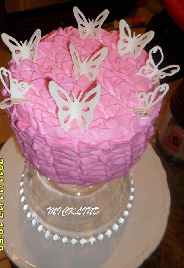 A BUTTERFLY RUFFLED CAKE