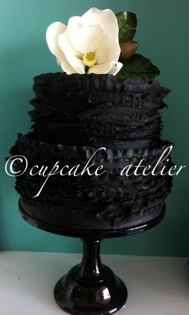 Magnolia & black ruffle cake