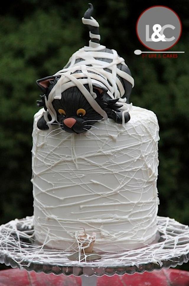 Mummy black cat birthday cake ... it's almost halloween