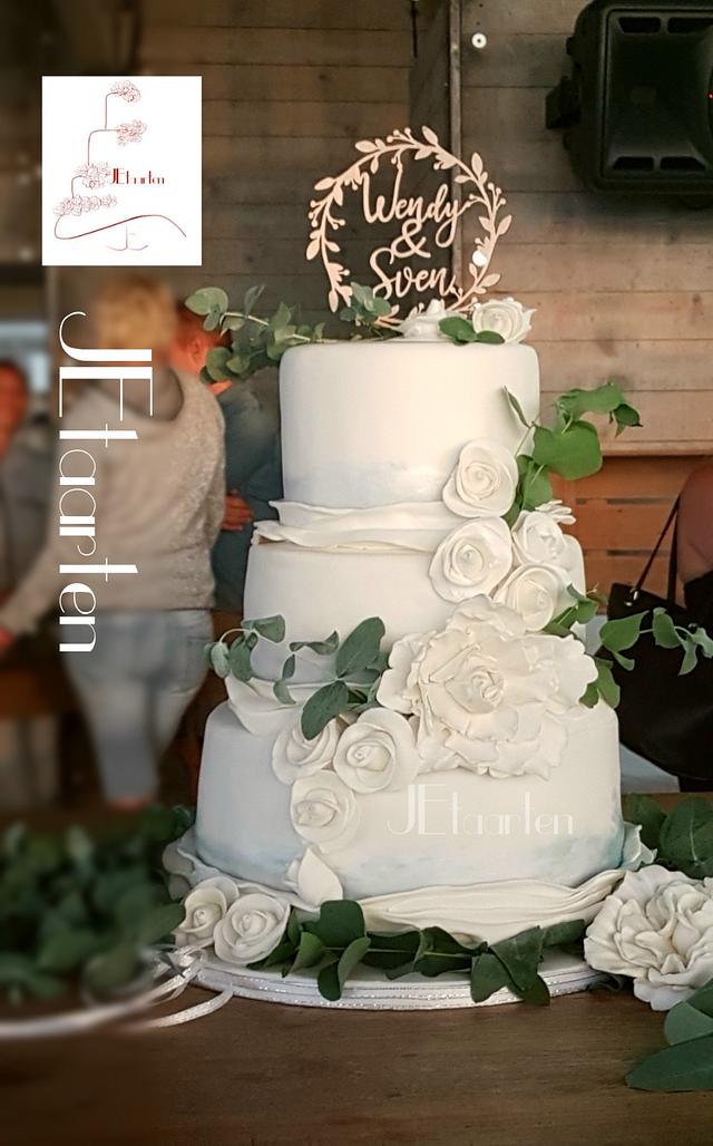 Weddingcake with roses, peonys, eucalyptus