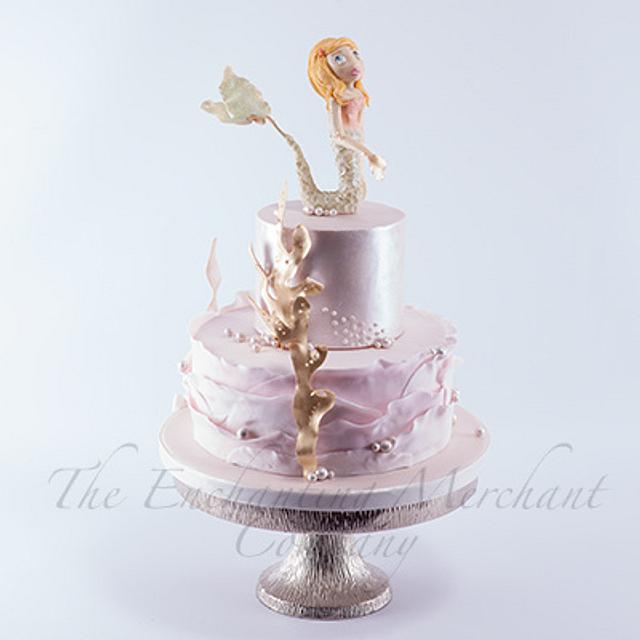 Pink and gold mermaid themed cake