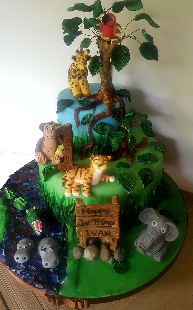 Animal Jungle Cake - Decorated Cake by Nimi - CakesDecor