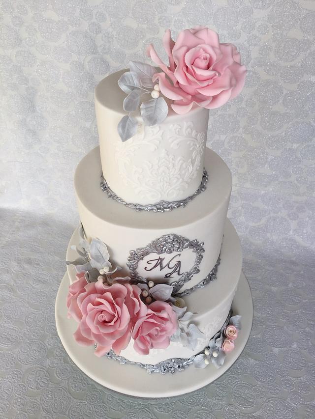 White & silver wedding cake - Cake by Layla A - CakesDecor