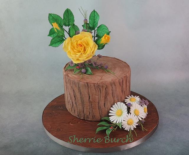 yellow rose and daisies stump cake MBalaska
