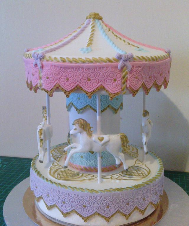 Carousel cake Decorated Cake by NooMoo CakesDecor