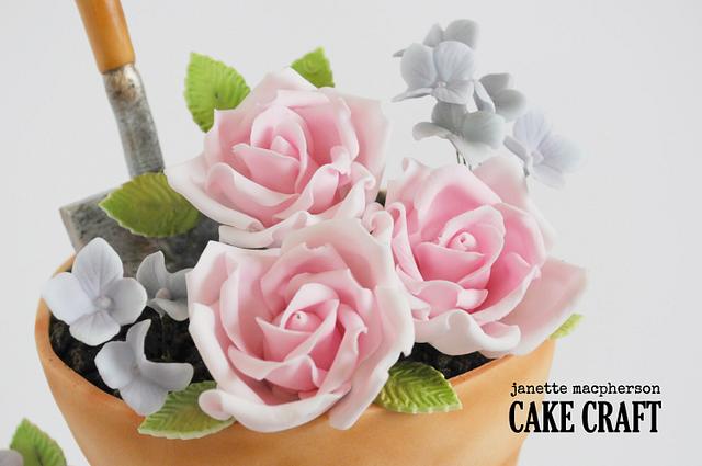Stacked flower pots birthday cake