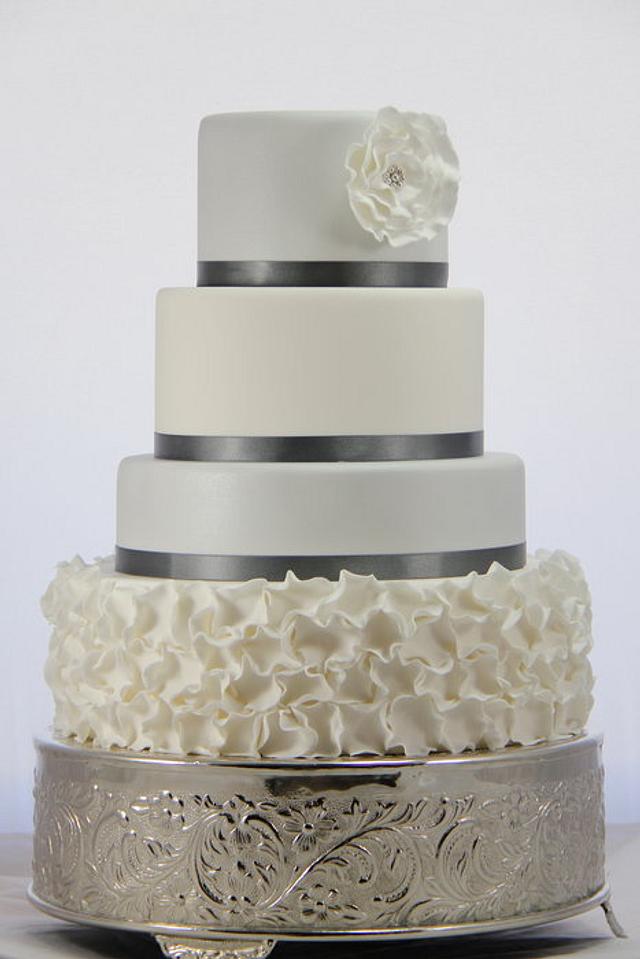 Silver and white ruffle wedding cake - Decorated Cake by - CakesDecor