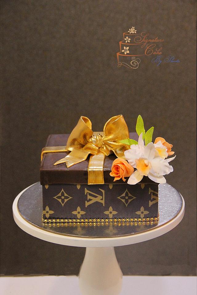 Louis Vuitton gift box - Decorated Cake by Frosted Dreams - CakesDecor