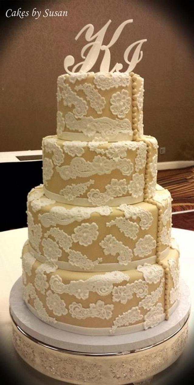 Lace and button wedding cake