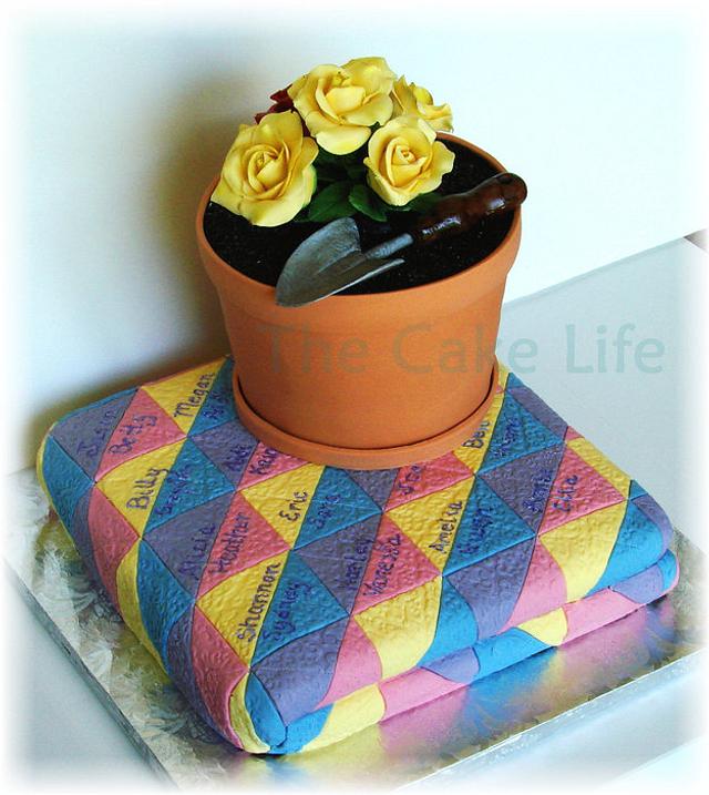 folded quilt and flower pot