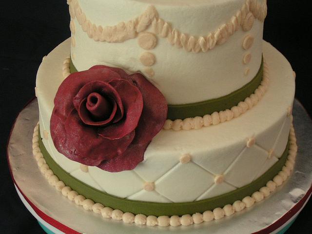 A single rose wedding cake
