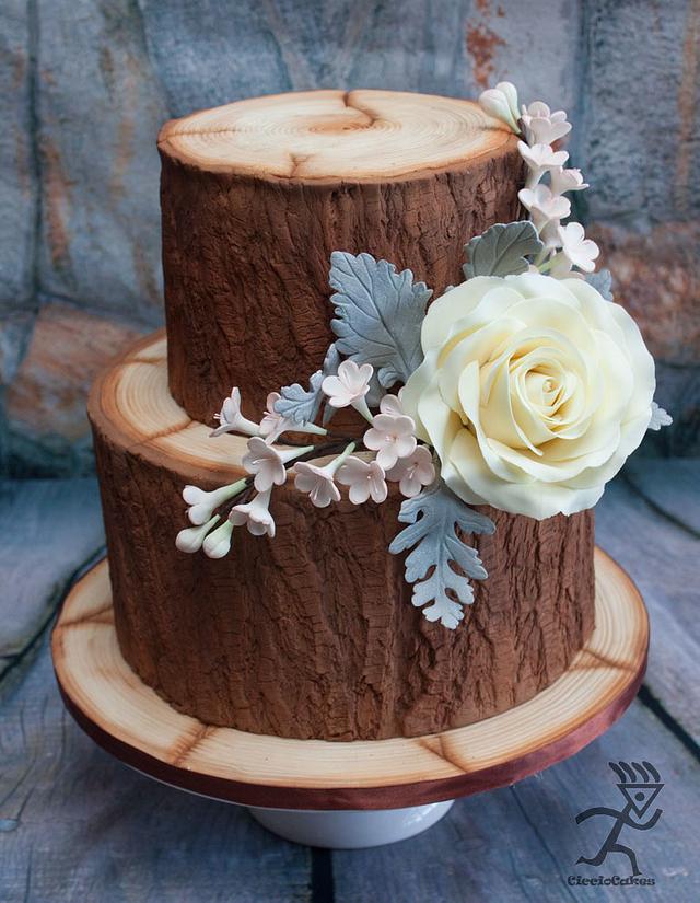 Tiered Wood Effect Cake With Edible Flowers Leaves Cakesdecor