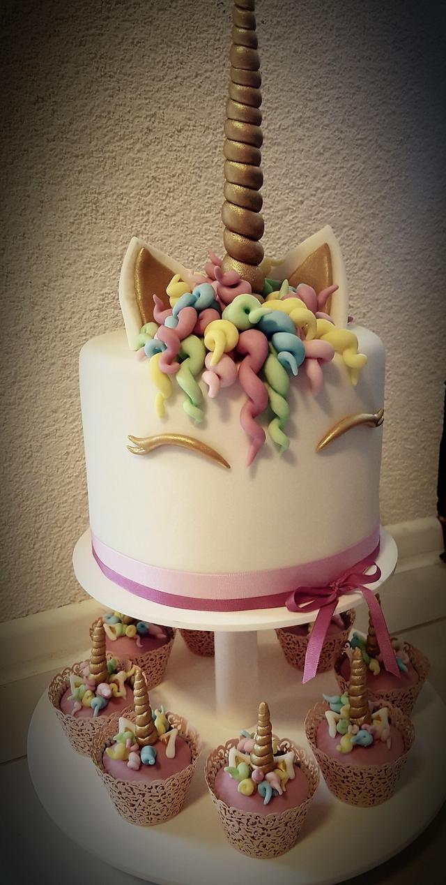 sweet unicorn with cupcakes