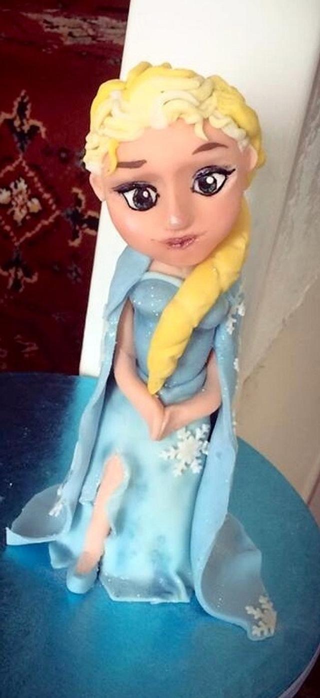 Hand sculpted Elsa from Frozen - Decorated Cake by Lou - CakesDecor