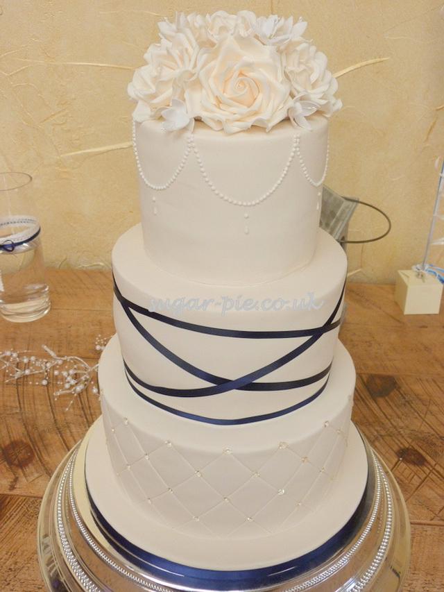 Navy ribbon and rose wedding cake - Cake by Sugar-pie - CakesDecor