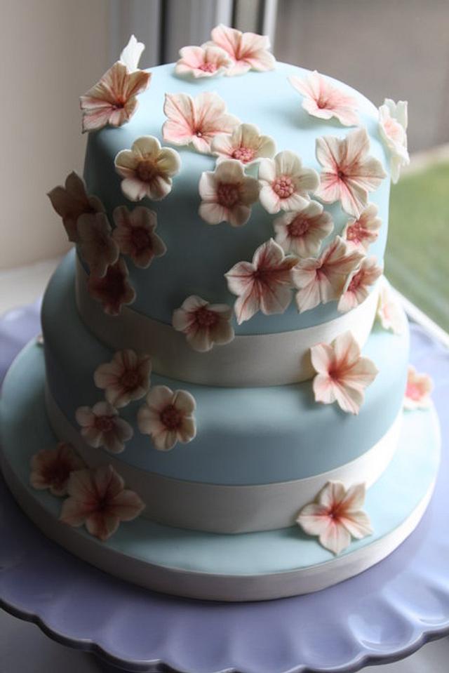 mini tiered pretty pastel blossoms cake - cake by - CakesDecor