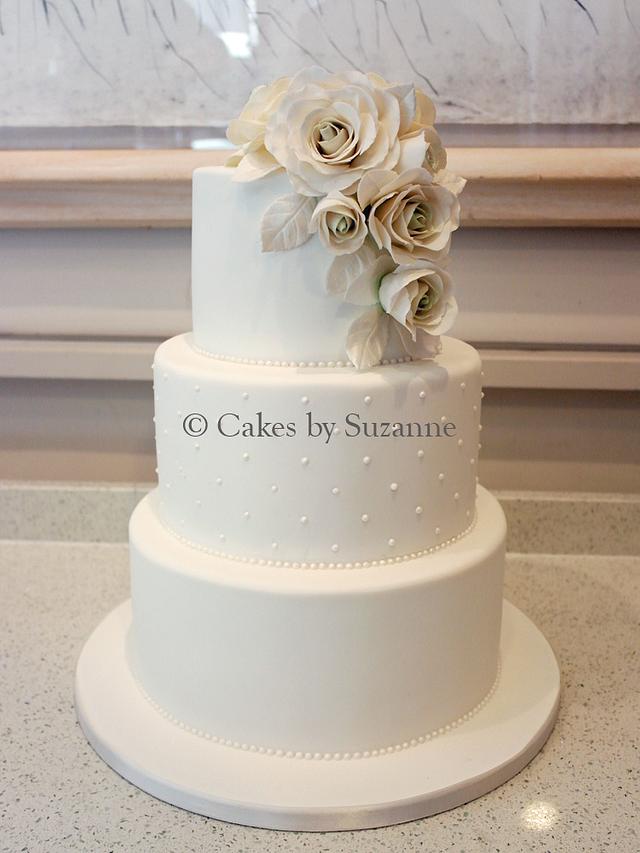 All white wedding cake - Decorated Cake by suzanne - CakesDecor