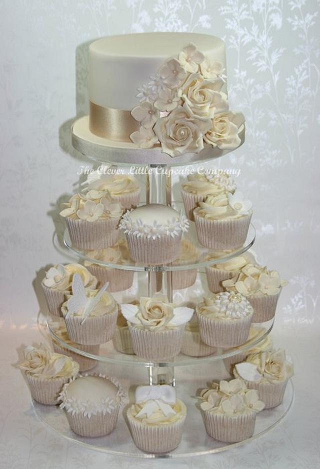 Ivory and White Wedding Cupcake Tower - cake by Amanda’s - CakesDecor
