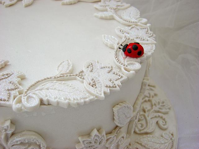 Lace cake with ladybug
