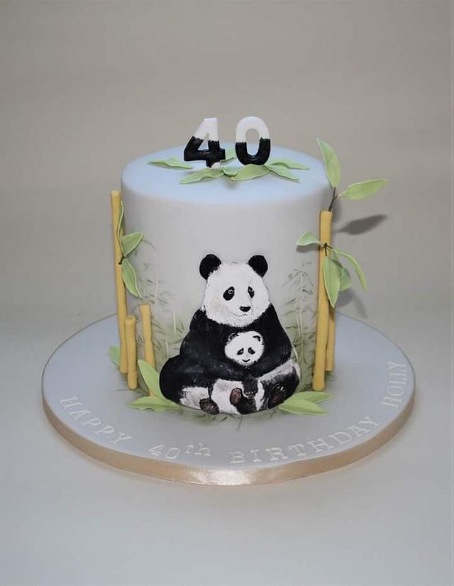 Premium Vector | Cute panda holding birthday cake vector illustration