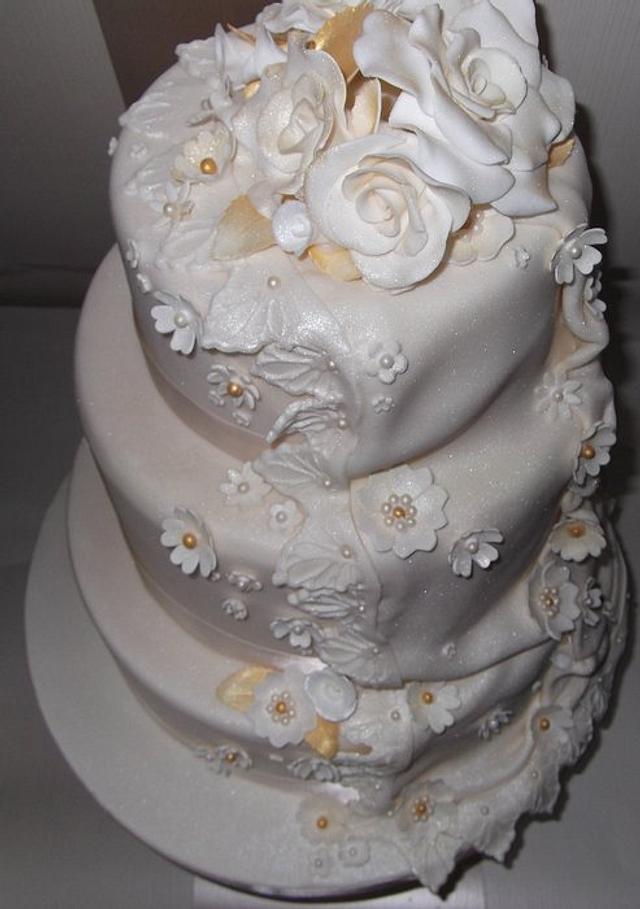 Cream and gold wedding cake