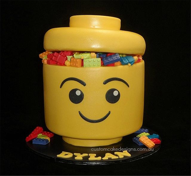 Lego Head Cake - Cake by Custom Cake Designs - CakesDecor