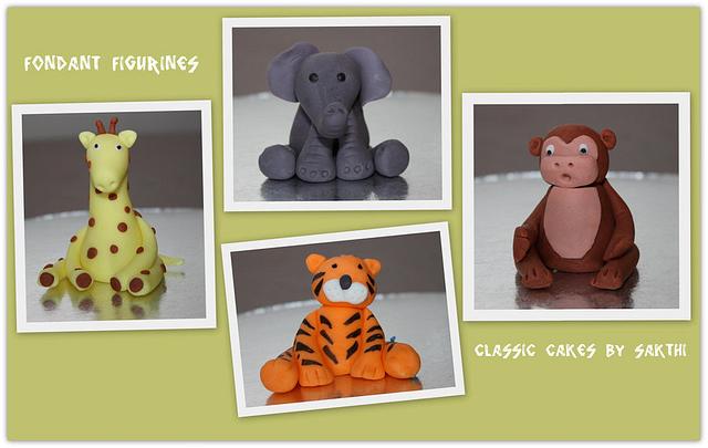 Fondant animal figurines - Cake by Classic Cakes by - CakesDecor