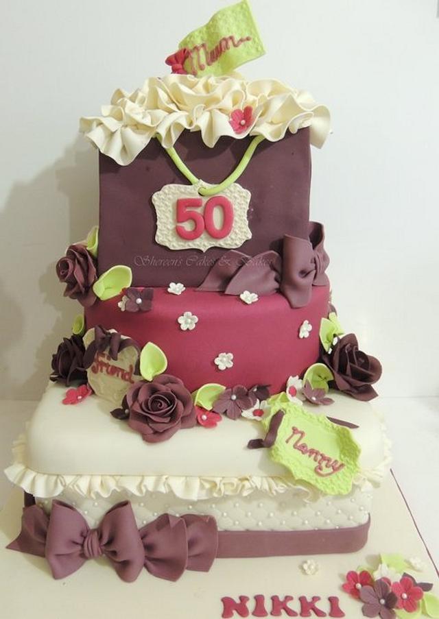 50th Celebration - Decorated Cake by Shereen - CakesDecor