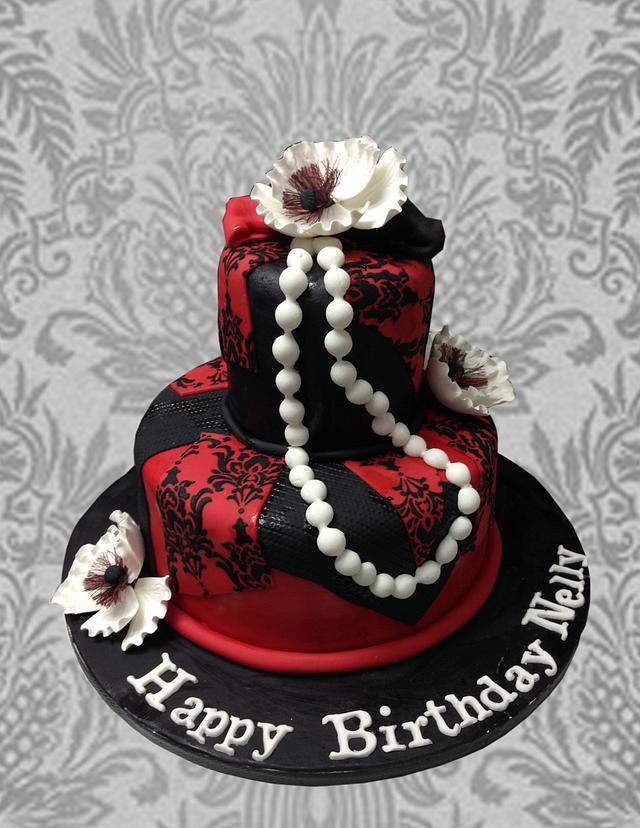 Red And Black Decorated Cake By Mstreatz Cakesdecor 3804