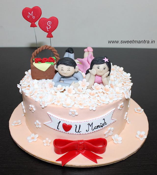 Anniversary Theme Cake With Flowers Decorated Cake By Cakesdecor 