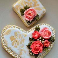 Heart with royal icing flowers and decoration.