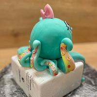 Baby octopus cake topper