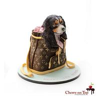 Puppy in a LV handbag cake 