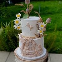 Two birds build a nest - wedding cake