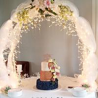 Navy and Rose gold Wedding Cake