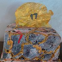 Gold crackle stone textured bas relief cake