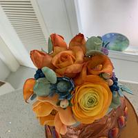 vase cake with flowers
