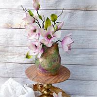 Vase with magnolias