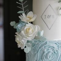 Blue rosette ruffles fondant wedding cake