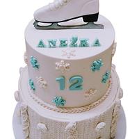 Two-tiered cake for a figure skater