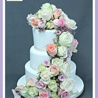 Traditional Wedding Cake with floral cascade