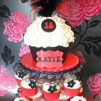 Burlesque themed giant cupcake and smaller cupcakes