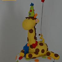 Giraffe topper celebration cake